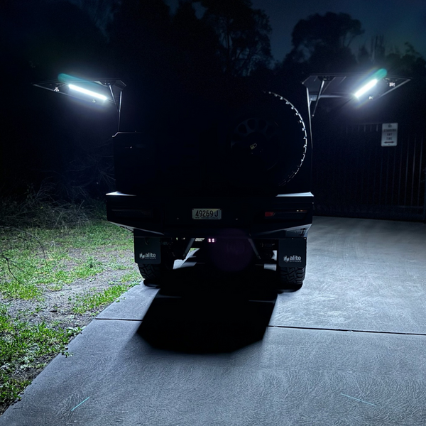 Polaris LED light bars, cool white, mounted on the inside of FJ45 canopy doors