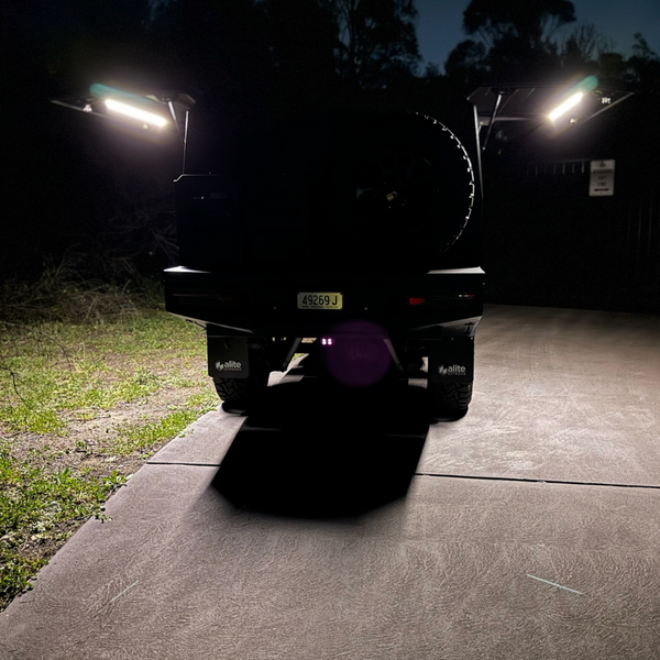 Polaris LED light bars, warm white, mounted on the inside of FJ45 canopy doors