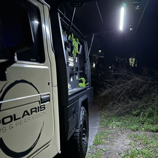 Polaris LED light bar Cool White mounted on a ute canopy inside door