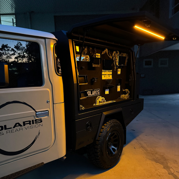 Polaris LED lights amber mounted on a ute canopy