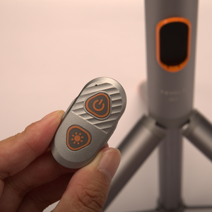 Wireless remote control for adjusting brightness and power on Tripod Adventure Light